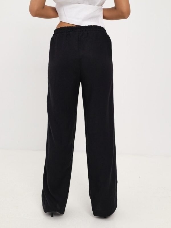 Wide linen pants with an elastic band, Blackly
